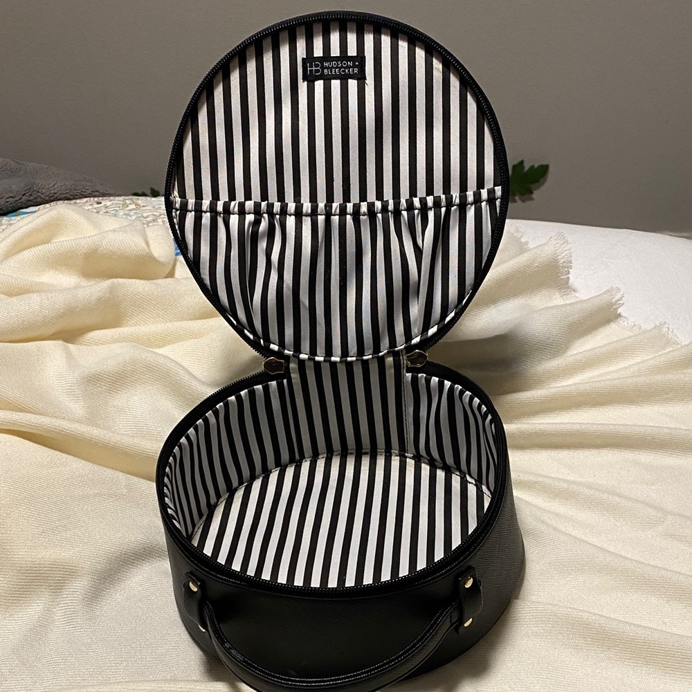 Black Round Travel Case with Striped Lining